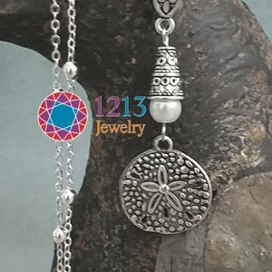 Handcreated Sand Dollar Necklace on a Sterling Silver Chain